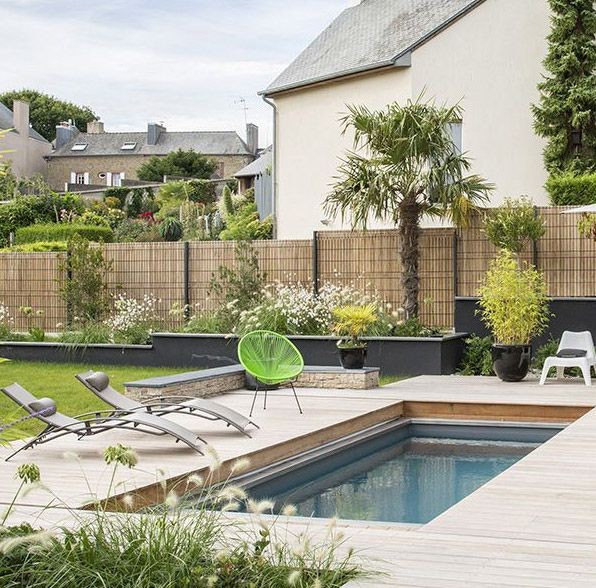 Piscine avec terrasse mobile