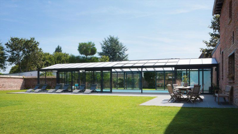De briques et de verre piscine sous veranda darchitecte Abri de piscine Véranda Blanc 